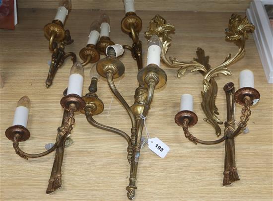 Two pairs of brass wall lights and two other wall lights